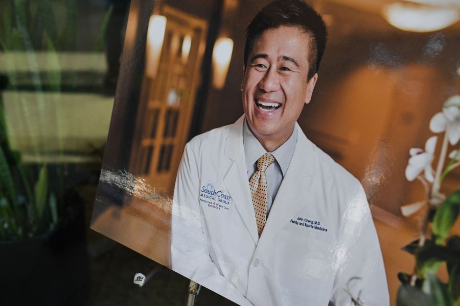 A photo of Dr. John Cheng is seen outside his office in Aliso Viejo on May 16, 2022. Cheng, 52, a family and sports medicine doctor was killed protecting others when a gunman opened fire at church services he was attending in nearby Laguna Woods California on May 15, 2022. (ROBYN BECK/AFP via Getty Images)