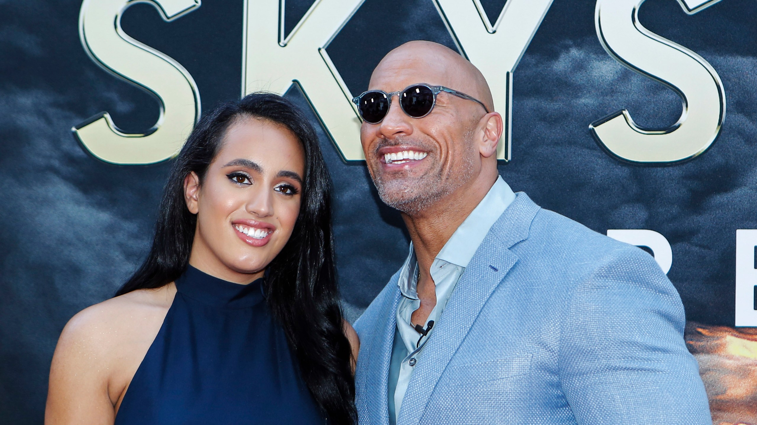 Dwayne Johnson and his daughter Simone Alexandra Johnson attend the premiere of "Skyscraper" on July 10, 2018 in New York City. (KENA BETANCUR/AFP via Getty Images)