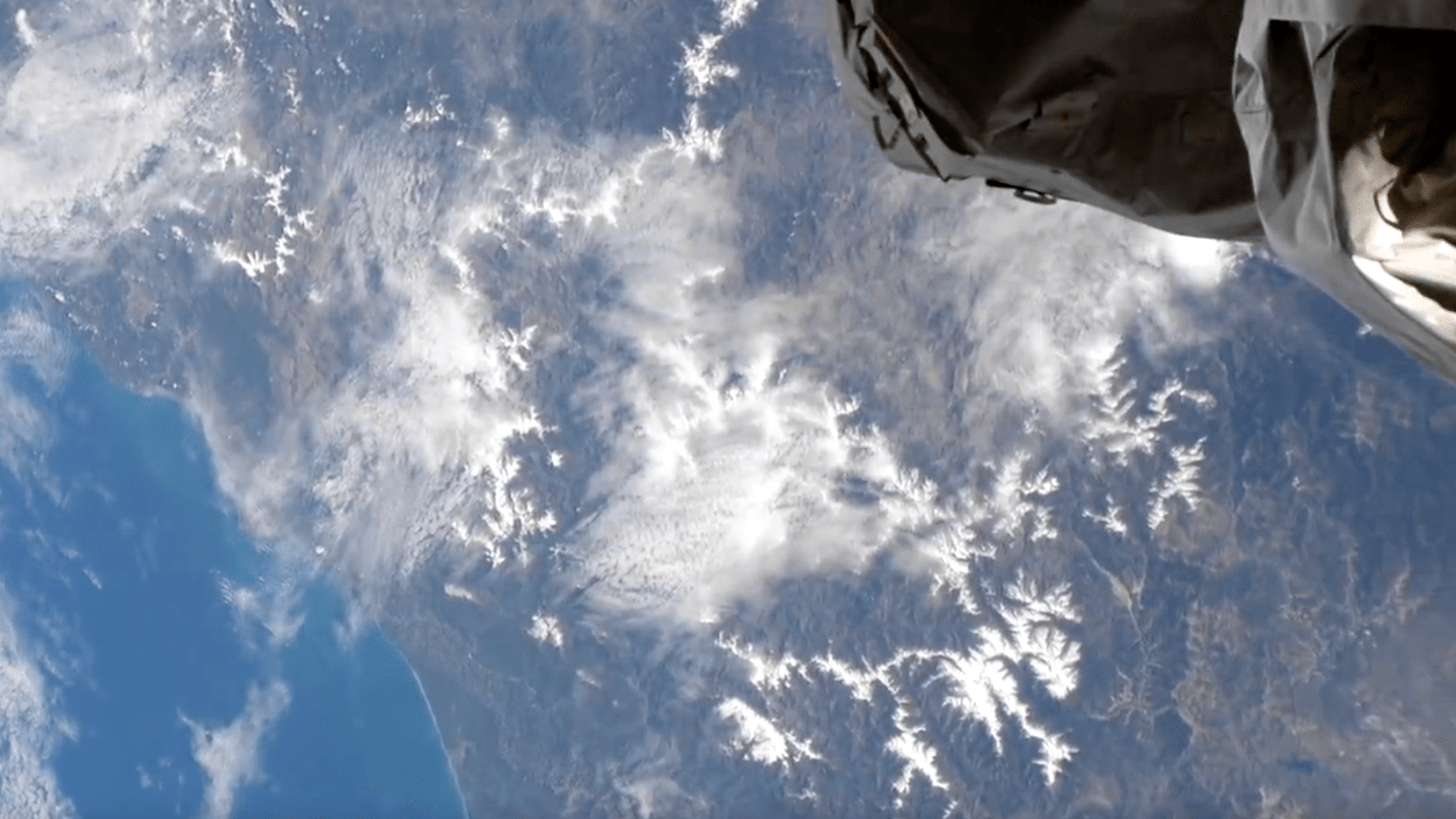 This April 29, 2022, image released by the ISS shows snow in Northern California and the Sierra Mountains.