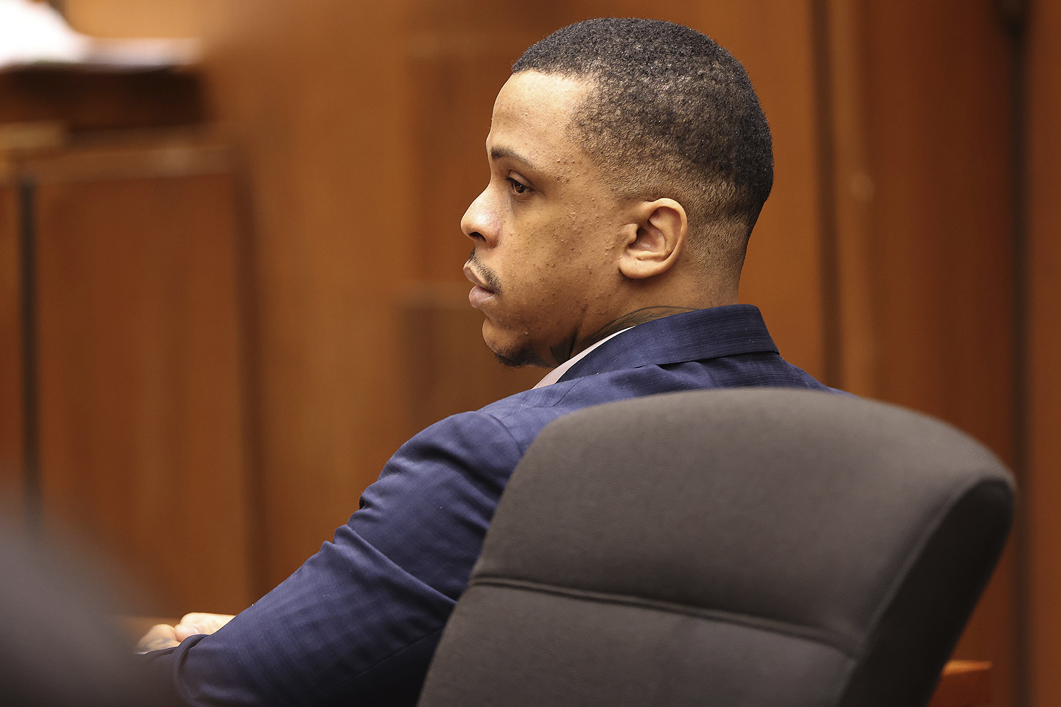 Defendant Eric Holder listens during opening statements in his murder trial on June 15, 2022, at Los Angeles Superior Court in Los Angeles. (Frederick M. Brown/Daily Mail.com via AP, Pool)