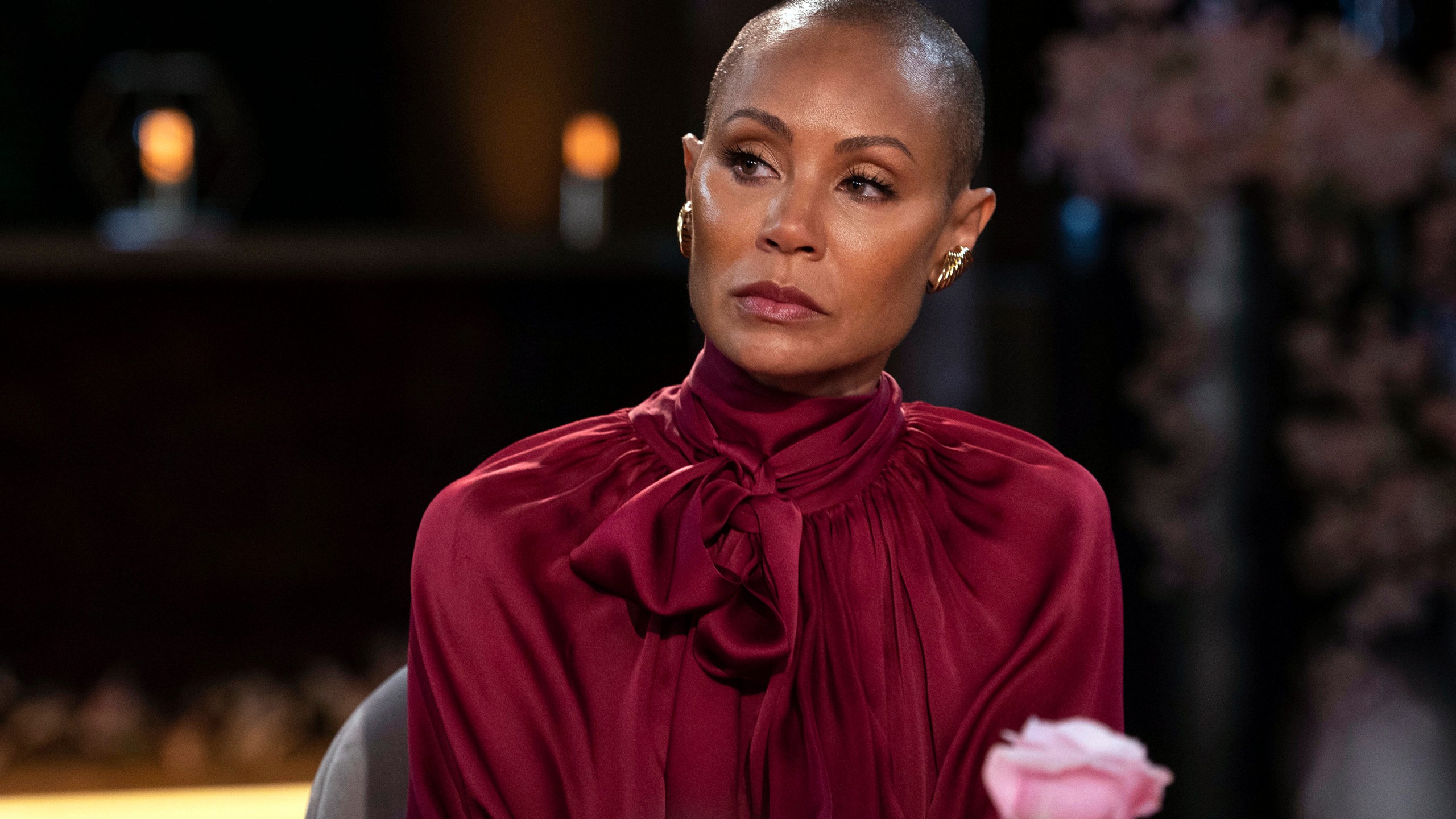 Jada Pinkett Smith appears on an episode of her online series "Red Table Talk." The latest episode, streaming Wednesday, June 1, 2022 on Facebook Watch, addresses alopecia. (Jordan Fisher/Red Table Talk via AP)