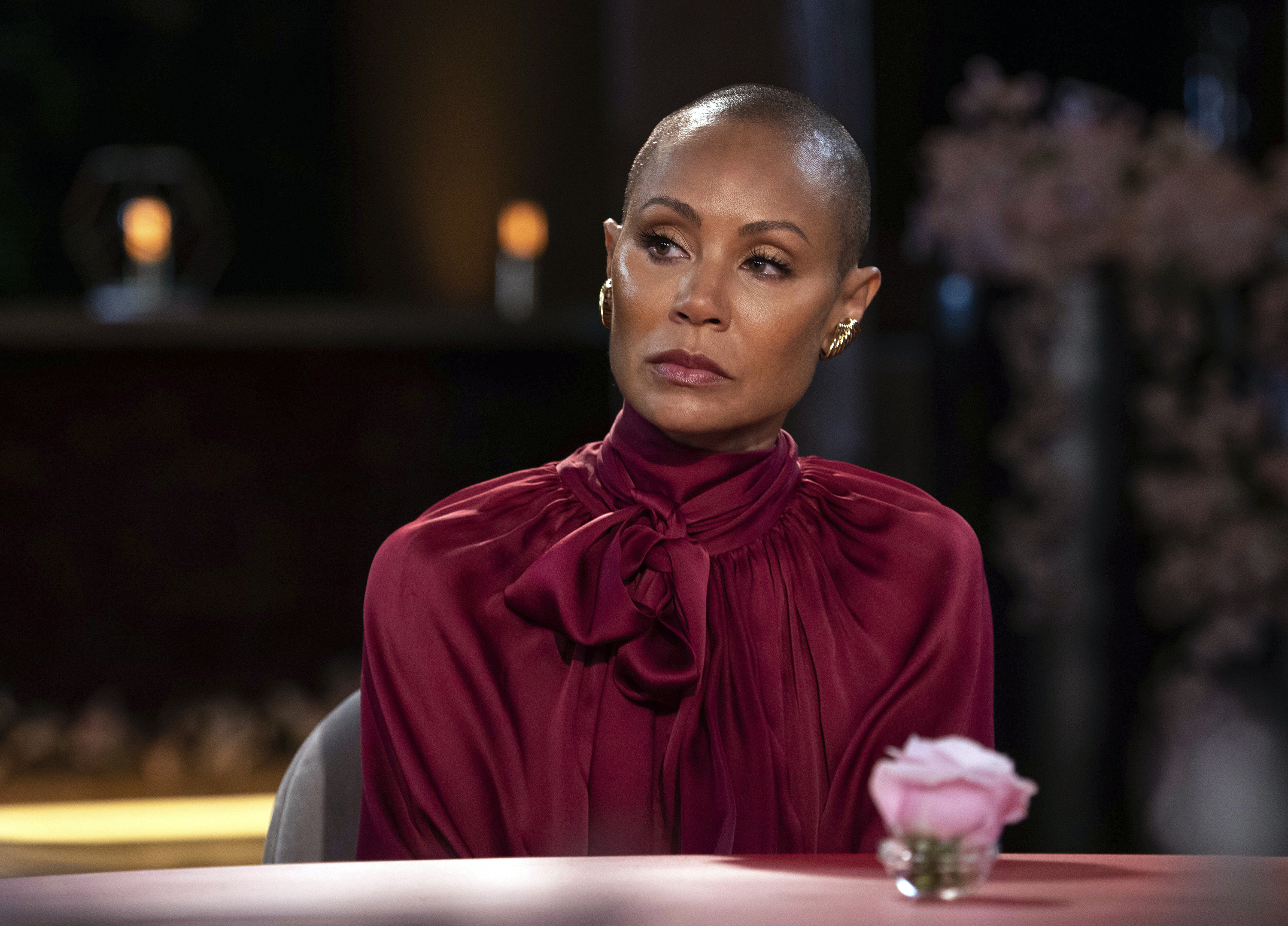 Jada Pinkett Smith appears on an episode of her online series "Red Table Talk." The latest episode, streaming Wednesday, June 1, 2022 on Facebook Watch, addresses alopecia. (Jordan Fisher/Red Table Talk via AP)