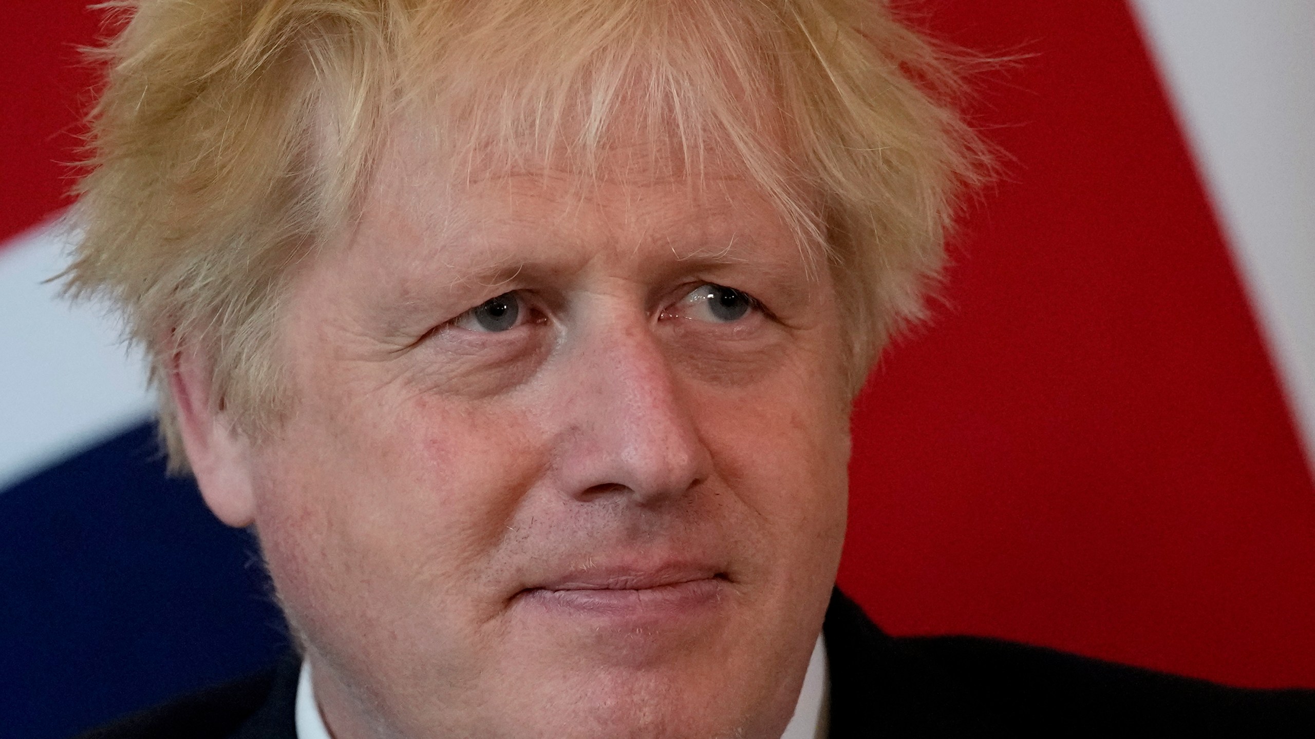 British Prime Minister Boris Johnson listens to the Amir of Qatar Sheikh Tamim bin Hamad Al Thani speak at the start of their meeting inside 10 Downing Street, in London on May 24, 2022. (Matt Dunham, Pool/AP)