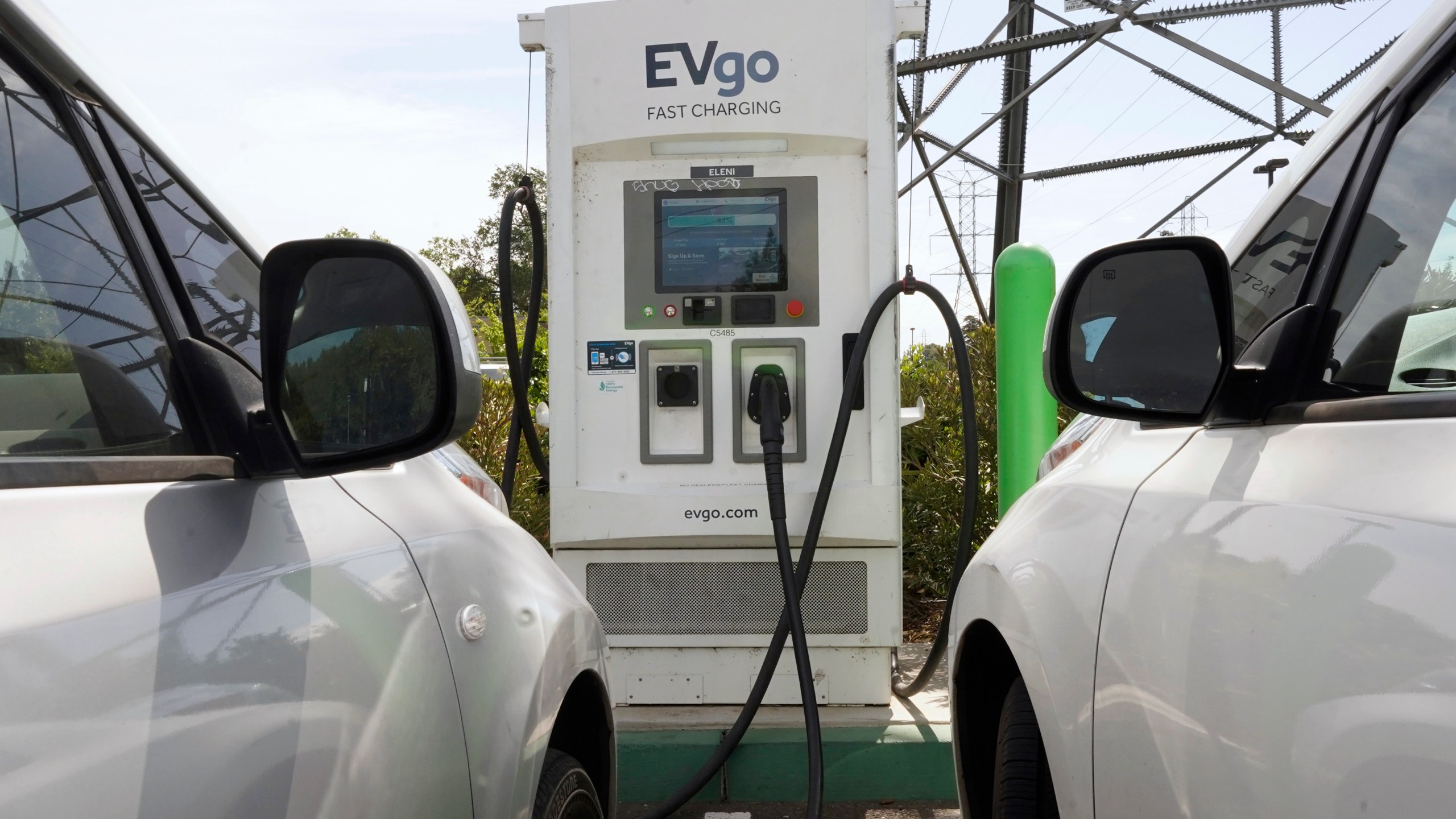 Electric cars are parked at a charging station in Sacramento, Calif., Wednesday, April 13, 2022. California air regulators will take public comment Thursday, June 23 2022, on a plan to slash fossil fuel use and reach carbon neutrality by 2045. (AP Photo/Rich Pedroncelli, File)