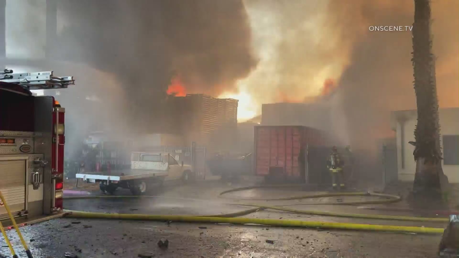 A pallet fire spread to nearby buildings in San Bernardino on June 18, 2022. (OnScene.TV)