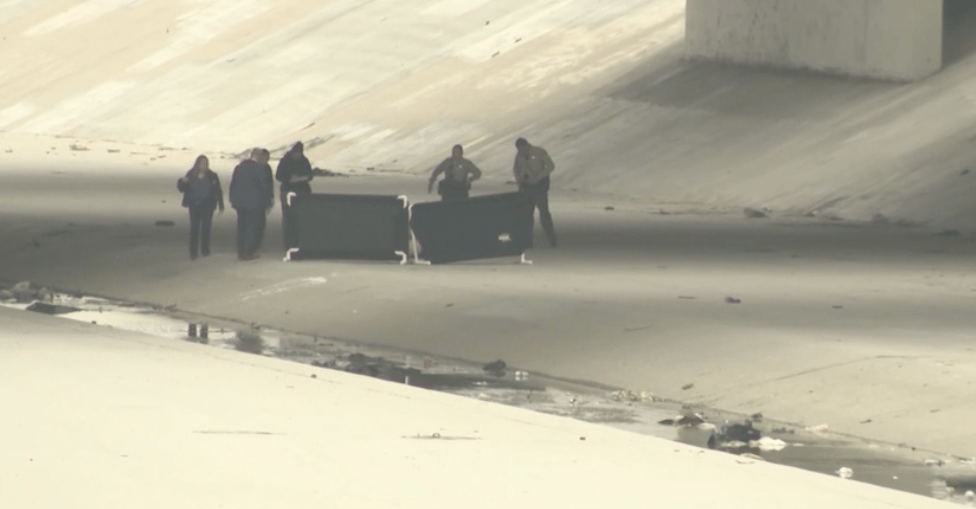 Authorities respond to a fatal shooting along the San Gabriel River bed in Norwalk on June 8, 2022. (KTLA)