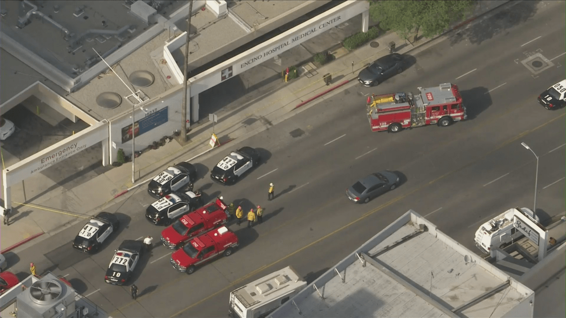 L.A. police and fire officials respond to a triple stabbing at Encino Hospital Medical Center on June 3, 2022. (KTLA)