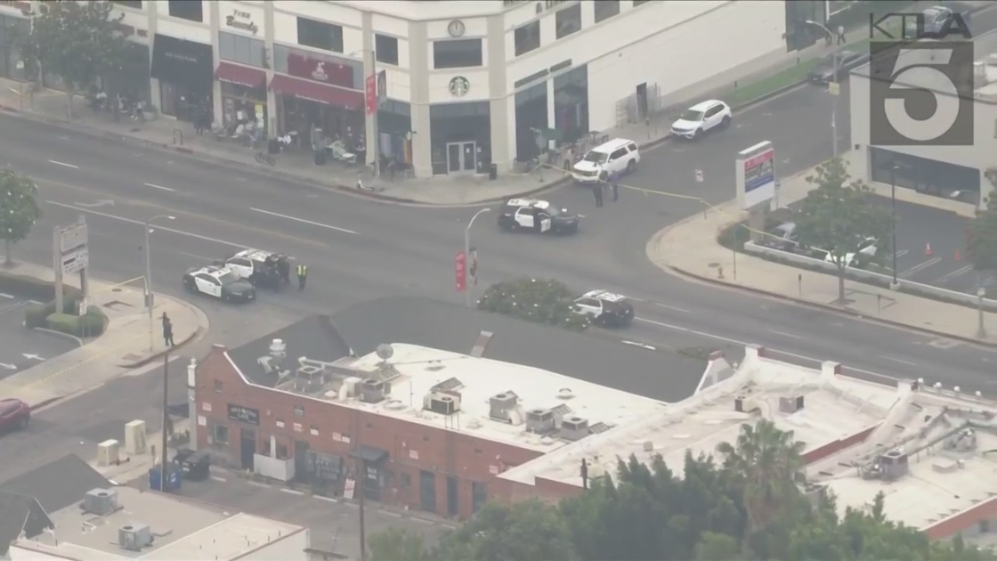 Authorities respond to an officer-involved shooting in the Fairfax area on June 17, 2022. (KTLA)