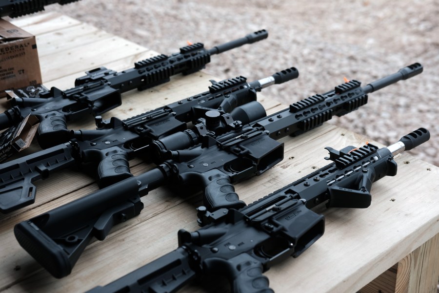 AR-15 rifles and other weapons are displayed on a table at a shooting range during the “Rod of Iron Freedom Festival” on Oct. 12, 2019 in Greeley, Pennsylvania. (Spencer Platt/Getty Images)