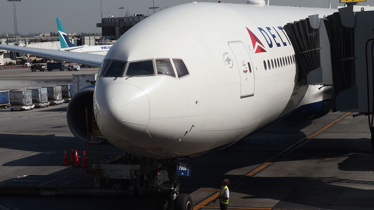 An Delta Air Lines plane sits on the tarmac at Los Angeles International Airport in Los Angeles on Oct. 29, 2019. (Daniel Slim/AFP via Getty Images)