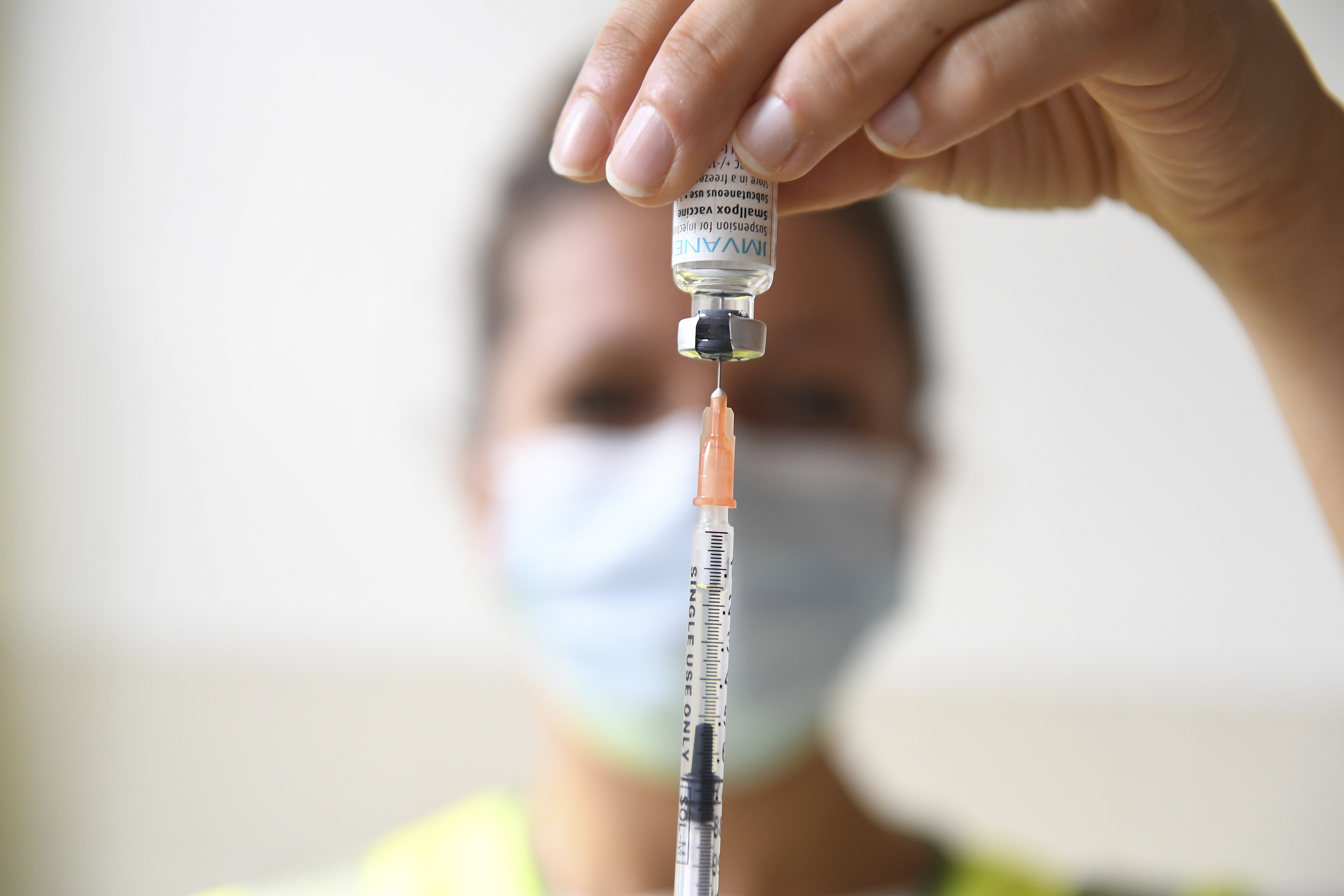 A health professional prepares a dose of a Monkeypox vaccine at the Edison municipal vaccination centre in Paris Wednesday July 27, 2022. Public health officials warn that moves by rich countries to buy large quantities of monkeypox vaccine, while declining to share doses with Africa, could leave millions of people unprotected against a more dangerous version of the disease and risk continued spillovers of the virus into humans. (Alain Jocard, Pool via AP, FIle)