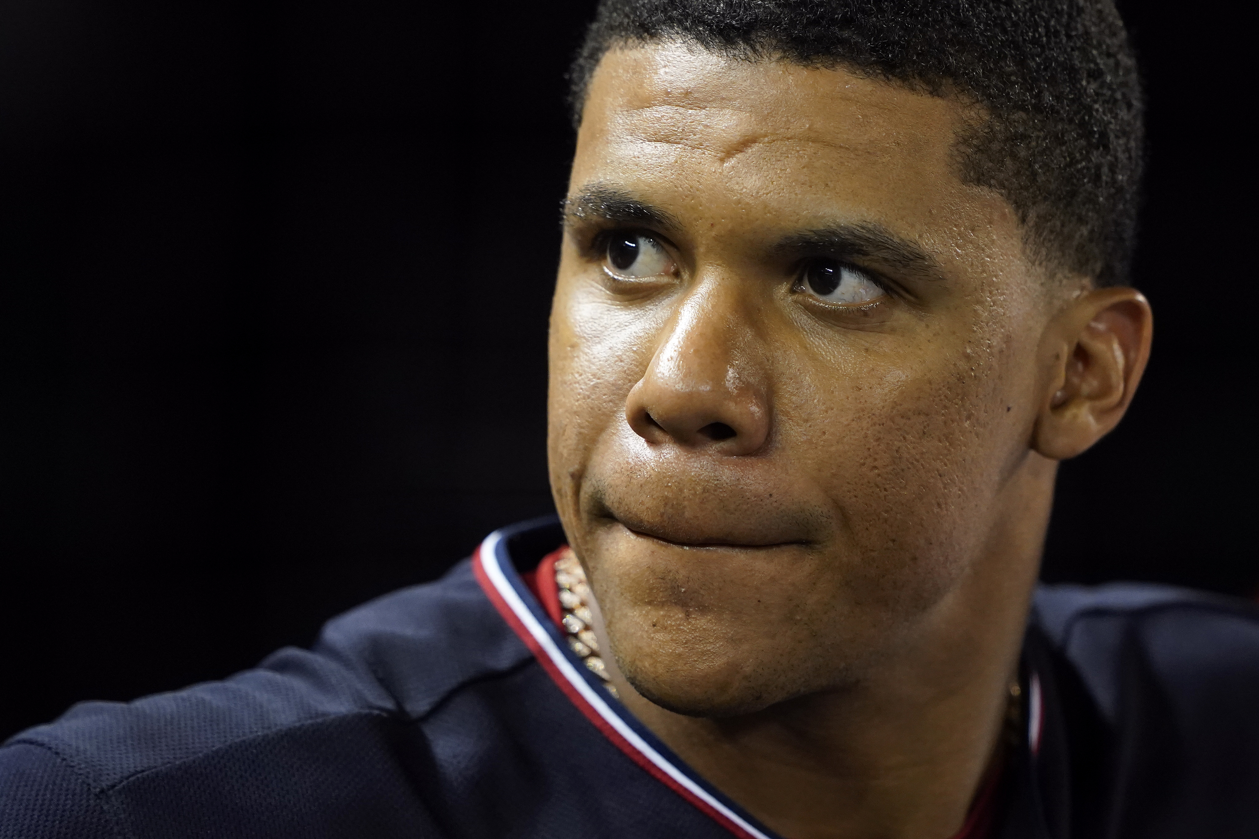 Washington Nationals' Juan Soto stands in the dugout in the seventh inning of a baseball game against the St. Louis Cardinals on July 29, 2022 in Washington. (Patrick Semansky/Associated Press)