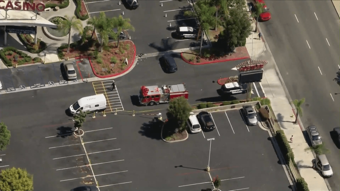 Authorities respond to a shooting investigation involving an armored van outside Hustler Casino in Gardena on Aug. 4, 2022. (KTLA)