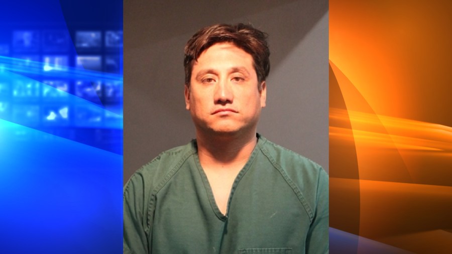 Orange County youth coach Chris Flores is seen in this booking photo provided by the Santa Ana Police Department on Aug. 11, 2022.