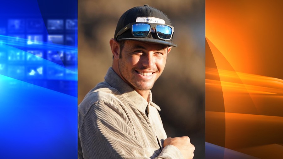 Ocean Lifeguard Derek Traeger is shown in a photo provided by the Los Angeles County Fire Department on Aug. 15, 2022.