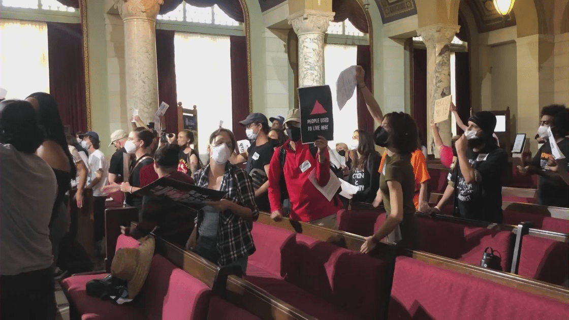 Protesters fill the Los Angeles City Council chamber during a vote on Aug. 2, 2022. (KTLA)