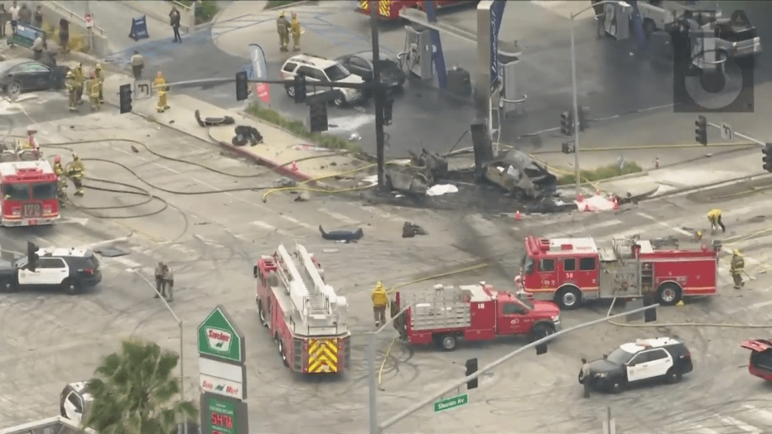 Crews respond to a crash at a Windsor Hills gas station on Aug. 4, 2022. (KTLA)