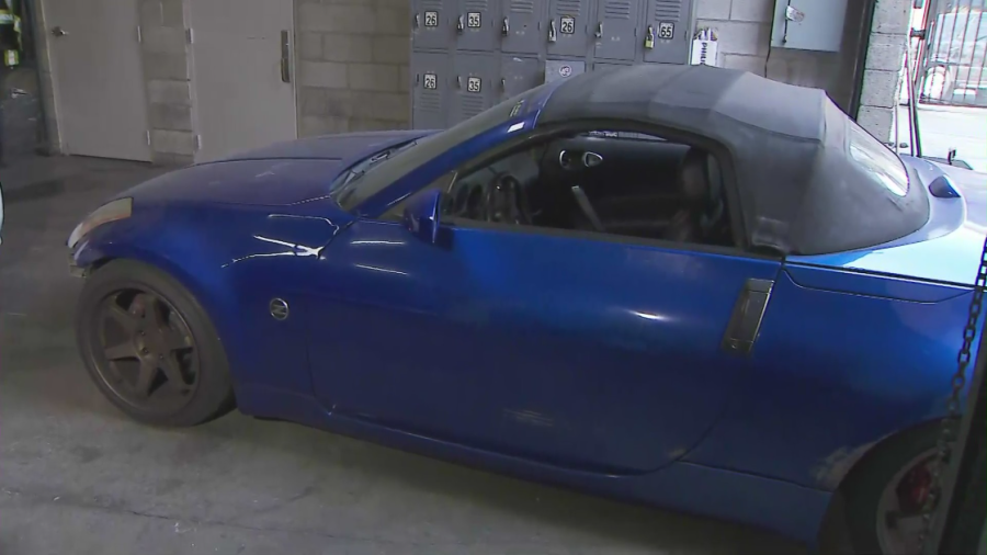 A vehicle involved in a street takeover is seen in a tow yard in South L.A. on Aug. 24, 2022. (KTLA)