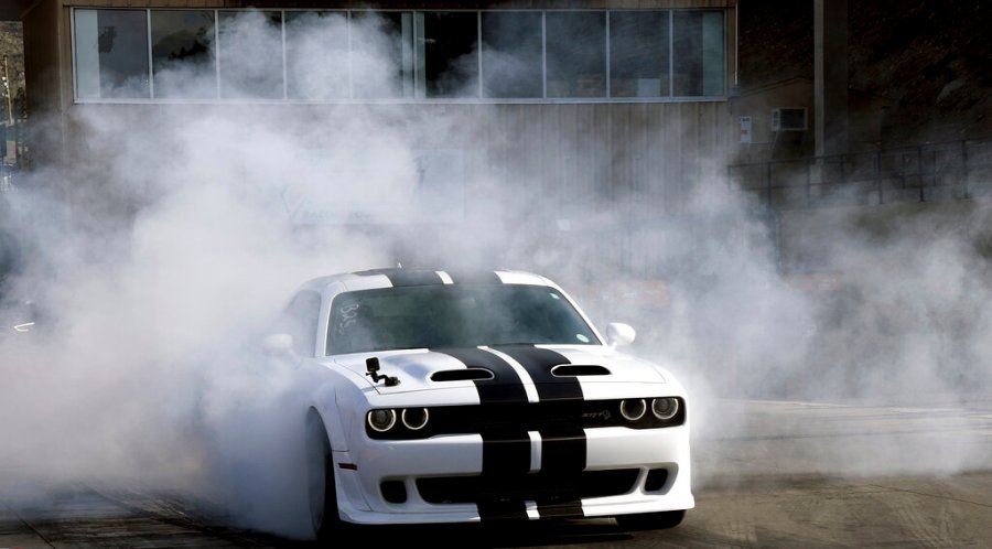 A driver warms up before a race at Bandimere Speedway west of Denver on May 5, 2021. The Colorado State Patrol runs a program called "Take it to the Track" in hopes of luring racers away from public areas to a safer and more controlled environment, even allowing participants to race a trooper driving a patrol car. The program's goals have gained new importance and urgency this year as illegal street racing has increased amid the coronavirus pandemic.