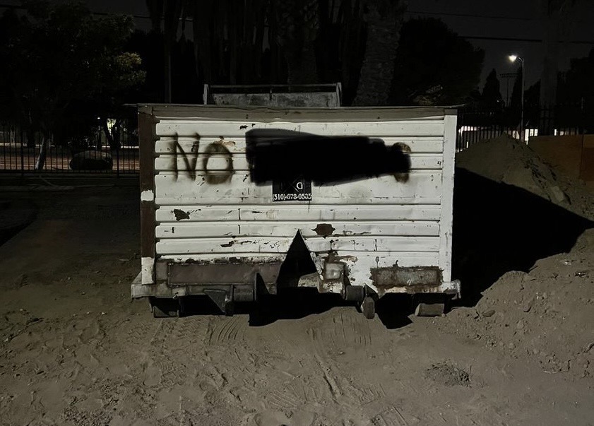 Vulgar content spray painted on a dumpster near Cal State University (Instagram/@devynebabyy)