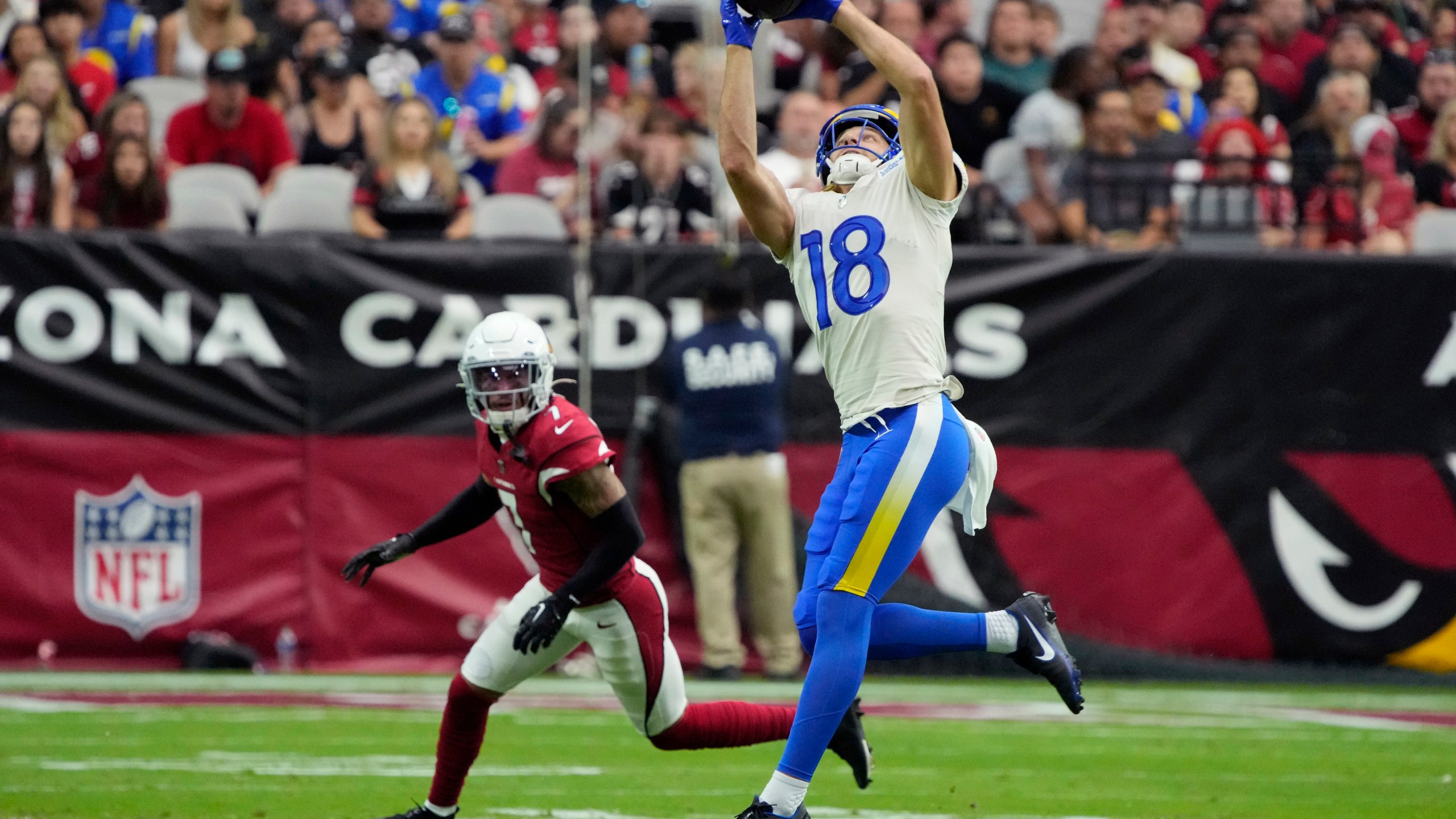 Los Angeles Rams wide receiver Ben Skowronek (18) makes a catch against Arizona Cardinals cornerback Byron Murphy Jr. (7) during the first half of an NFL football game, Sunday, Sept. 25, 2022, in Glendale, Ariz. (AP Photo/Rick Scuteri)