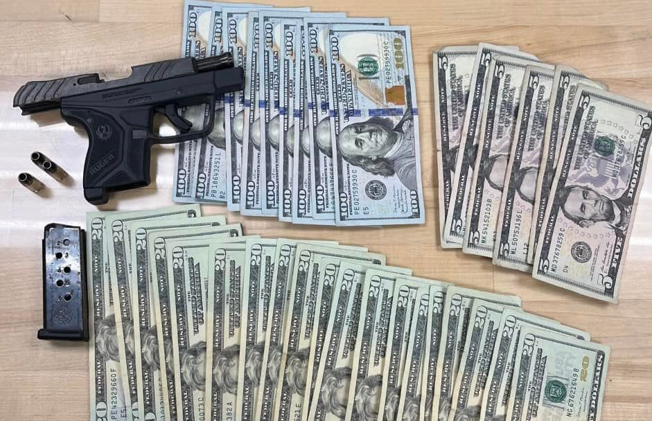 On Sept. 2, 2022, the Culver City Police Department released this photo of a gun and cash police seized during the arrest of Randall Wiley.