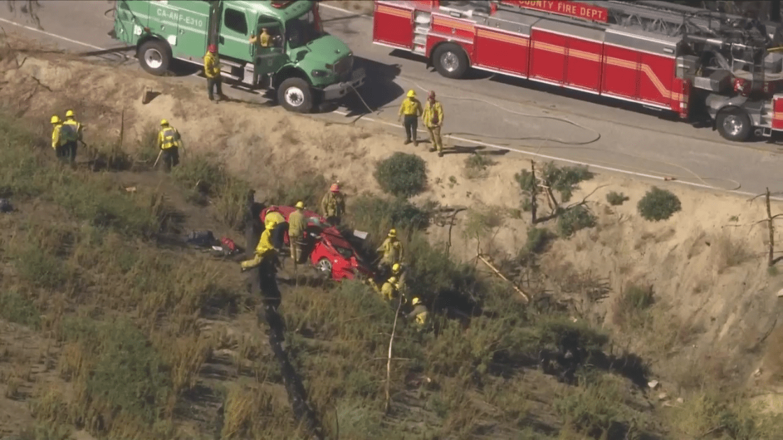 Firefighters respond to a double fatal crash along the Angeles Crest Highway above Arcadia on Sept. 16, 2022. (KTLA)