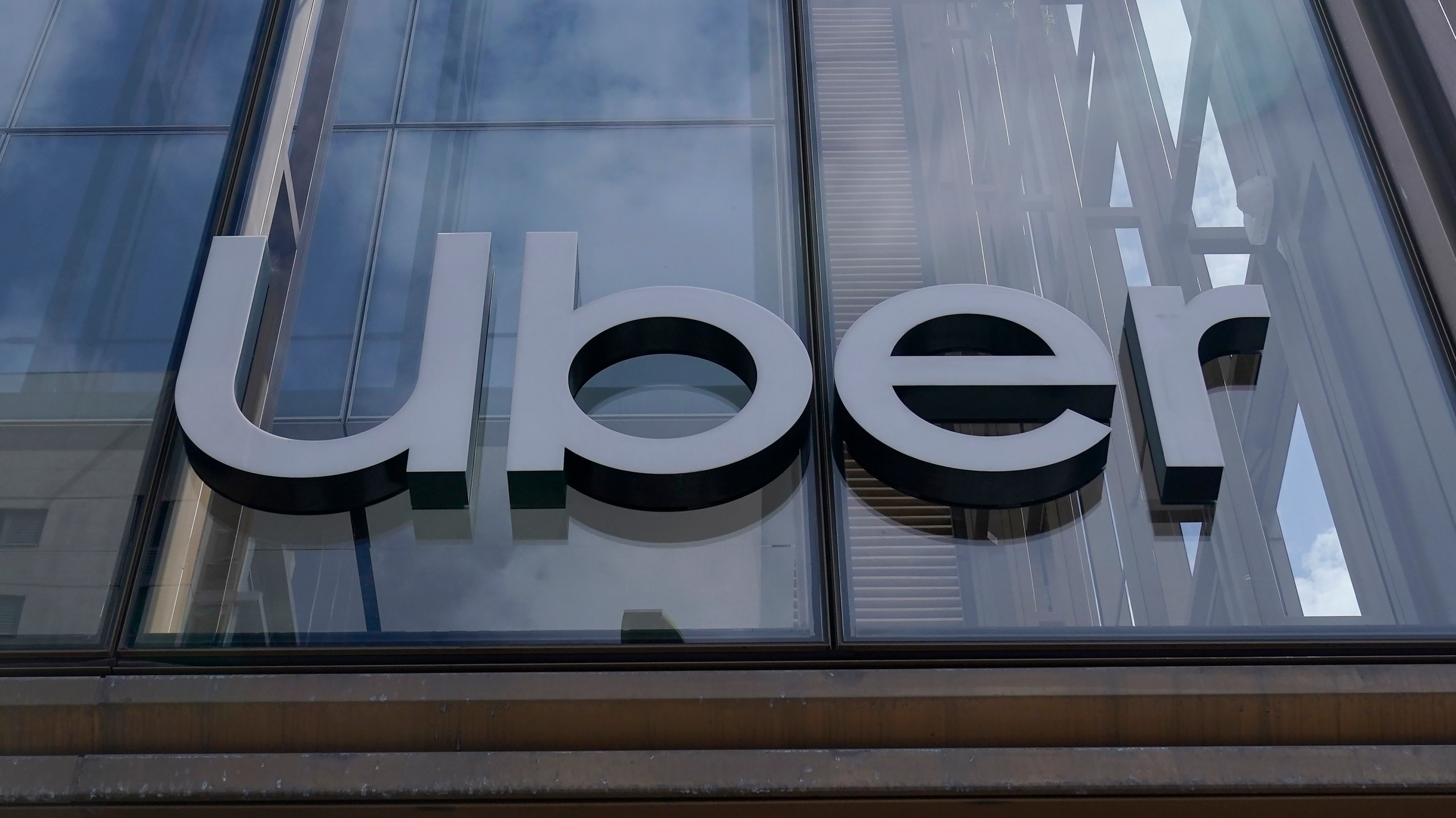 An Uber sign is displayed at the company's headquarters in San Francisco on Sept. 12, 2022. (Jeff Chiu/Associated Press)