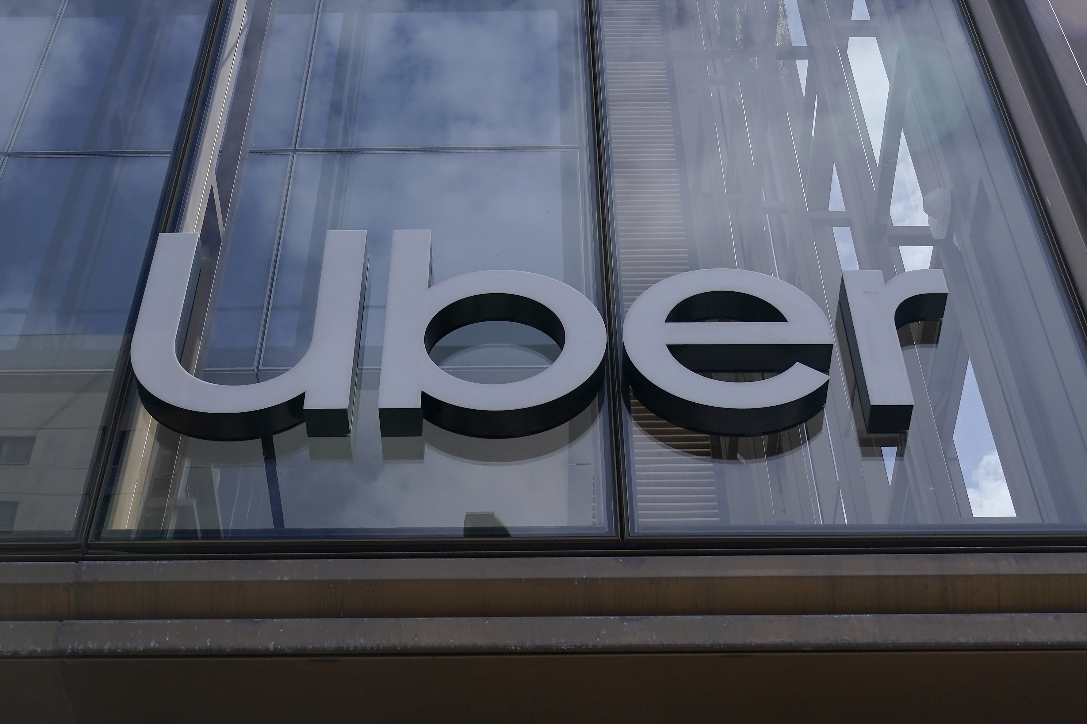 An Uber sign is displayed at the company's headquarters in San Francisco on Sept. 12, 2022. (Jeff Chiu/Associated Press)