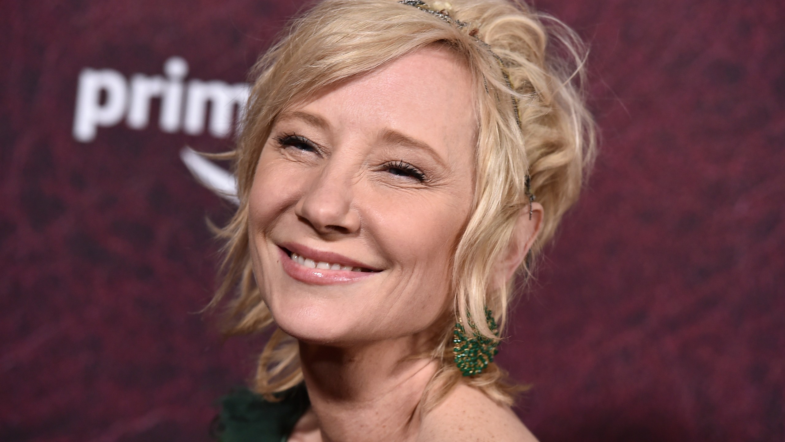 Anne Heche arrives at the premiere of "The Tender Bar" at the TCL Chinese Theatre, on Dec. 12, 2021, in Los Angeles. The coroner's office says actor Heche died from burns and inhalation injury after her fiery car crash and the death has been ruled an accident. The cause of her death was released on the Los Angeles County coroner's website Wednesday, Aug. 17, 2022, although a formal autopsy report is still being completed. (Jordan Strauss/Invision/AP, File)