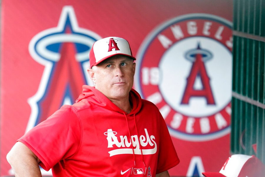 Los Angeles Angels manager Phil Nevin looks on from the dugout before a baseball game against the Oakland Athletics Tuesday, Aug. 2, 2022, in Anaheim. (Marcio Jose Sanchez/Associated Press)