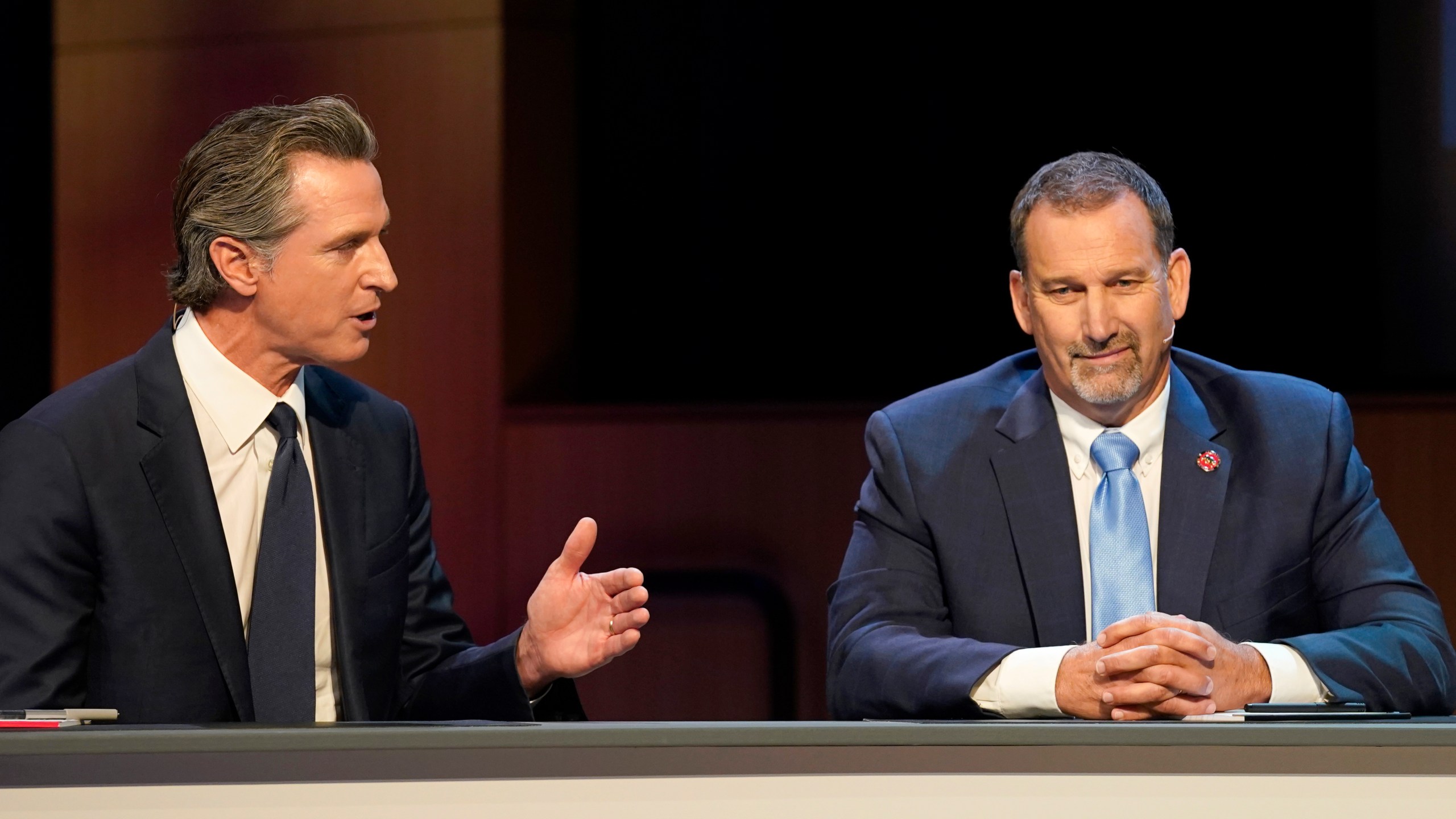 Gubernatorial candidates Democratic Gov. Gavin Newsom, left, and Republican challenger state Sen. Brian Dahle spar during their debate held by KQED Public Television in San Francisco on Sunday, Oct. 23, 2022. (AP Photo/Rich Pedroncelli, Pool)