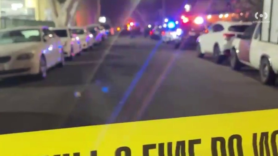 Crime scene tape and law enforcement vehicles are seen at the scene of a deadly shooting in Lynwood on Oct. 8, 2022, as seen in images shared to the Citizen app.