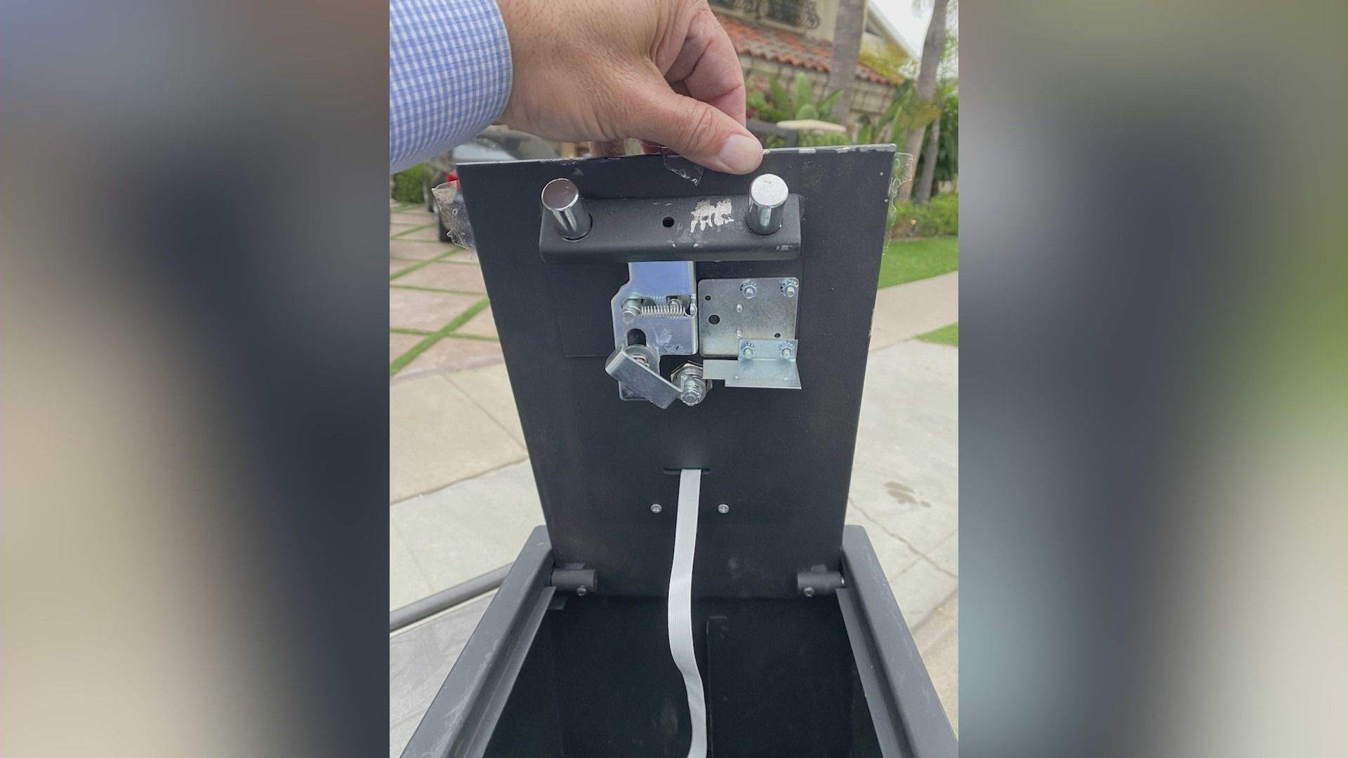 Safe box ripped from the walls during a Huntington Beach home invasion.