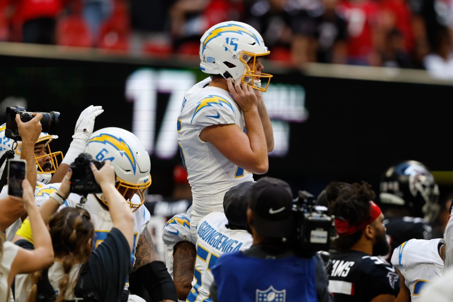 Los Angeles Chargers place kicker Cameron Dicker celebrates after kicking a 37-yard field goal on the final play of an NFL football game against the Atlanta Falcons, Sunday, Nov. 6, 2022, in Atlanta. The Chargers won 20-17. (AP Photo/Butch Dill)