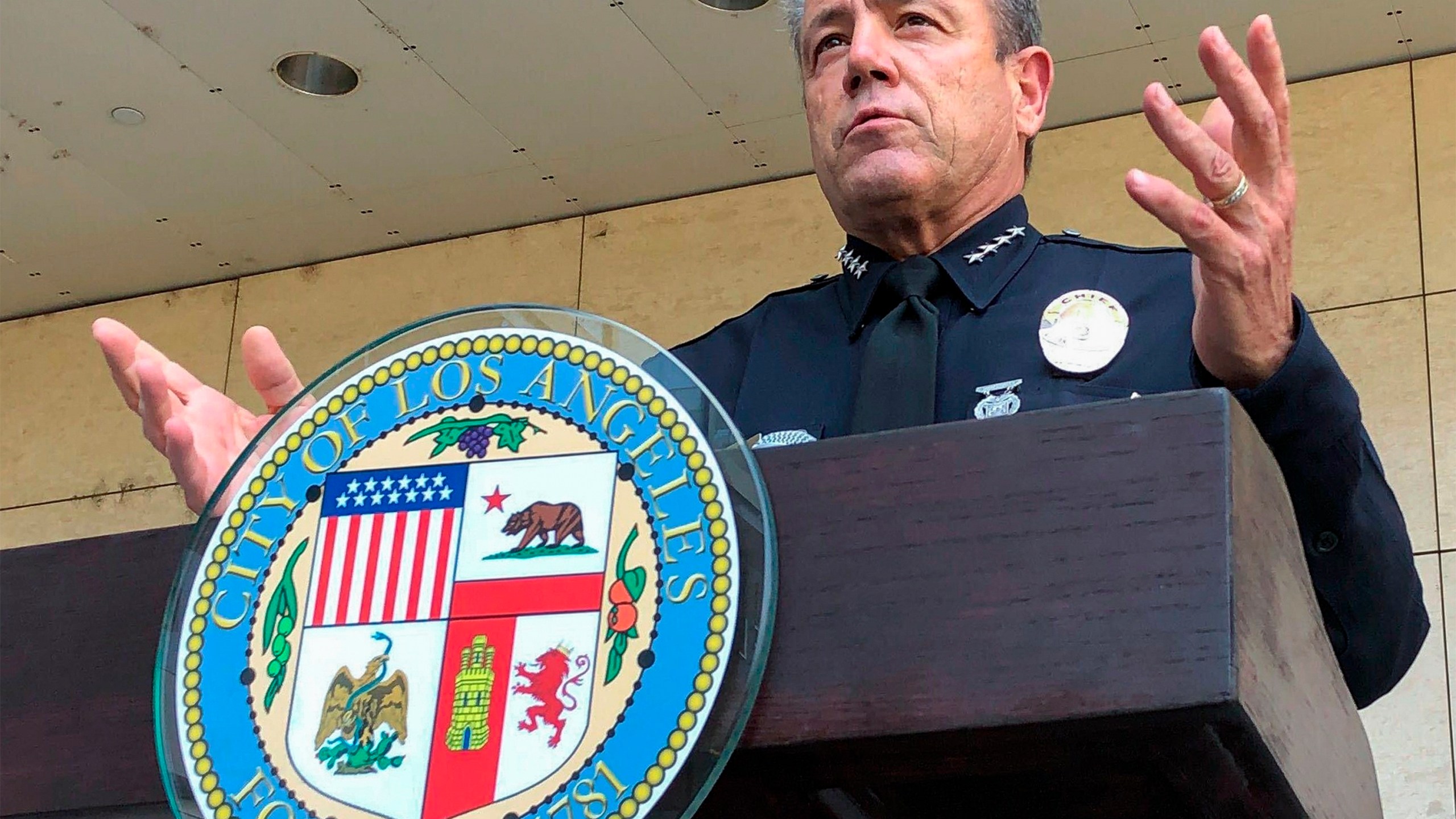 In this Aug. 26, 2020, file photo, Los Angeles Police Chief Michel Moore speaks during a news conference outside LAPD headquarters in Los Angeles. (AP Photo/Stefanie Dazio, File)