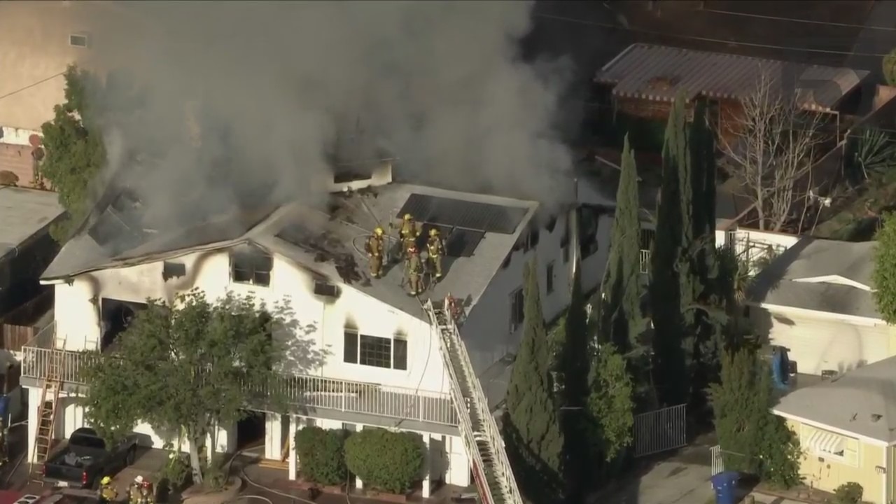 Firefighters battled a house fire in Arleta on Dec. 22, 2022. (KTLA)