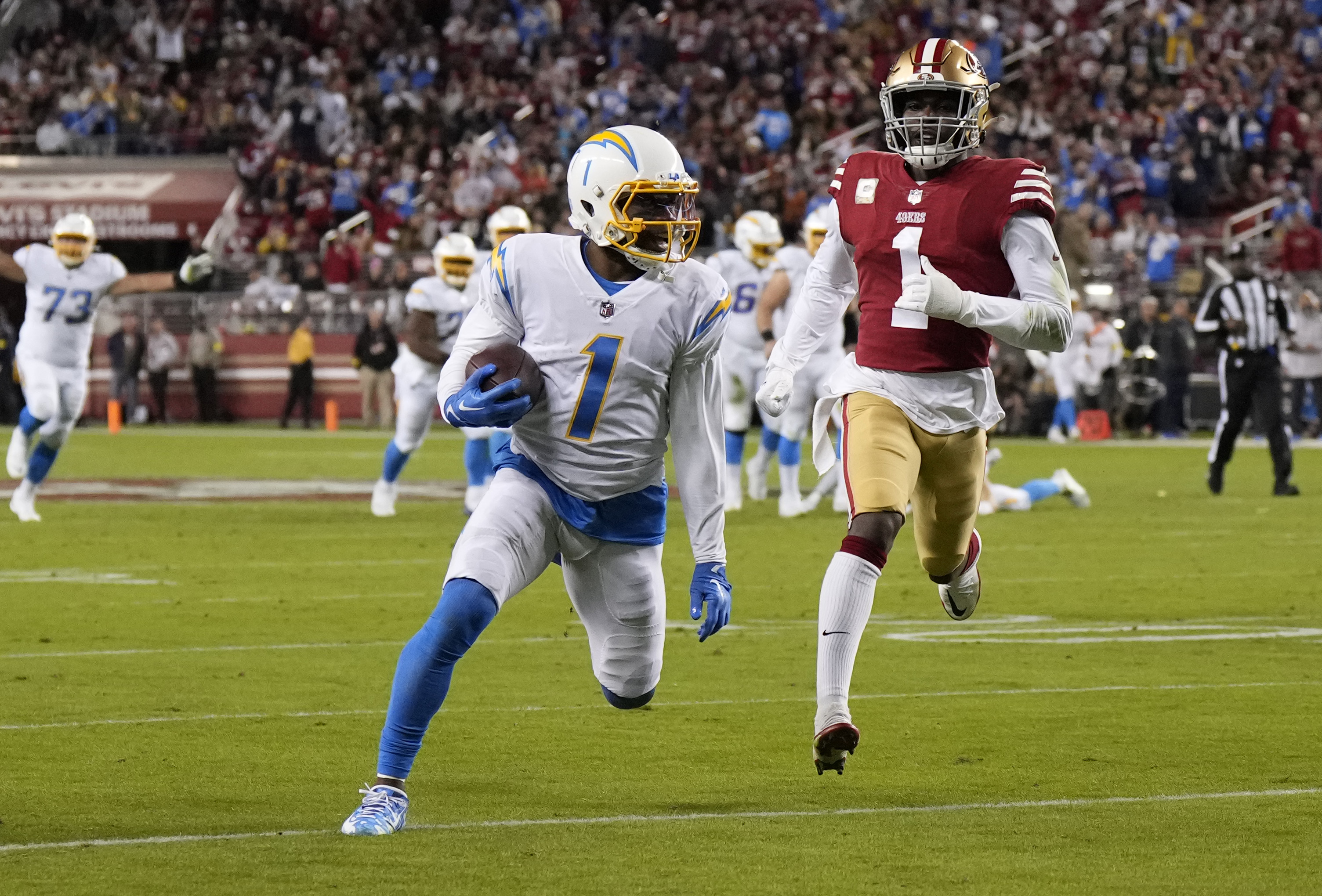 DeAndre Carter of the Los Angeles Chargers runs after catching a pass during the second quarter against the San Francisco 49ers at Levi's Stadium on Nov. 13, 2022, in Santa Clara. (Thearon W. Henderson/Getty Images)