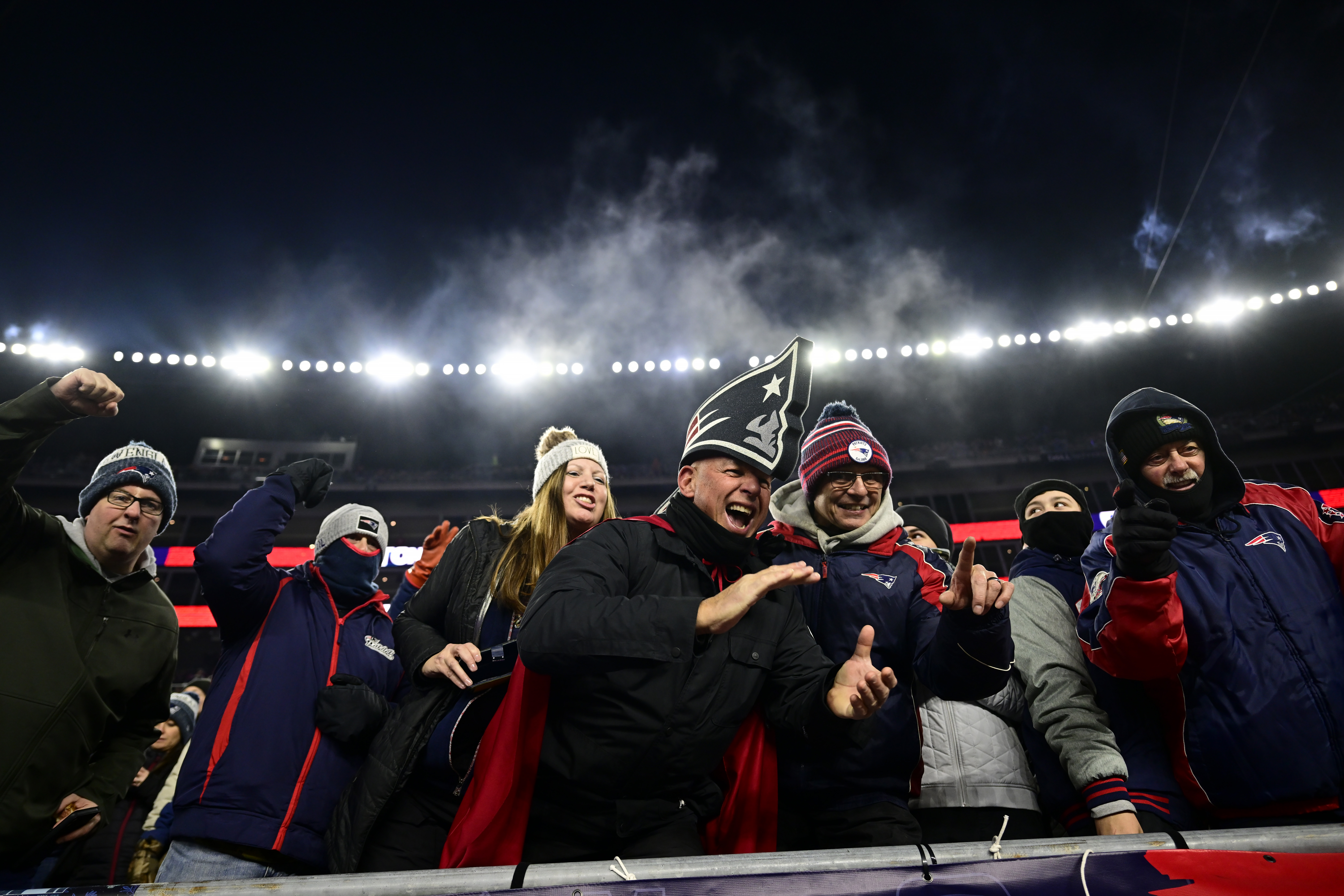 If an NJ.Bet survey is right, these Patriots fans are likely mocking the Buffalo Bills and their supporters on Dec. 1, 2022, in Foxborough, Massachusetts. (Billie Weiss/Getty Images)