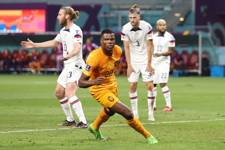 Denzel Dumfries of Netherlands celebrates after scoring the team's third goal during the FIFA World Cup Qatar 2022 Round of 16 match between Netherlands and USA at Khalifa International Stadium on Dec. 3, 2022, in Doha, Qatar. (Richard Heathcote/Getty Images)