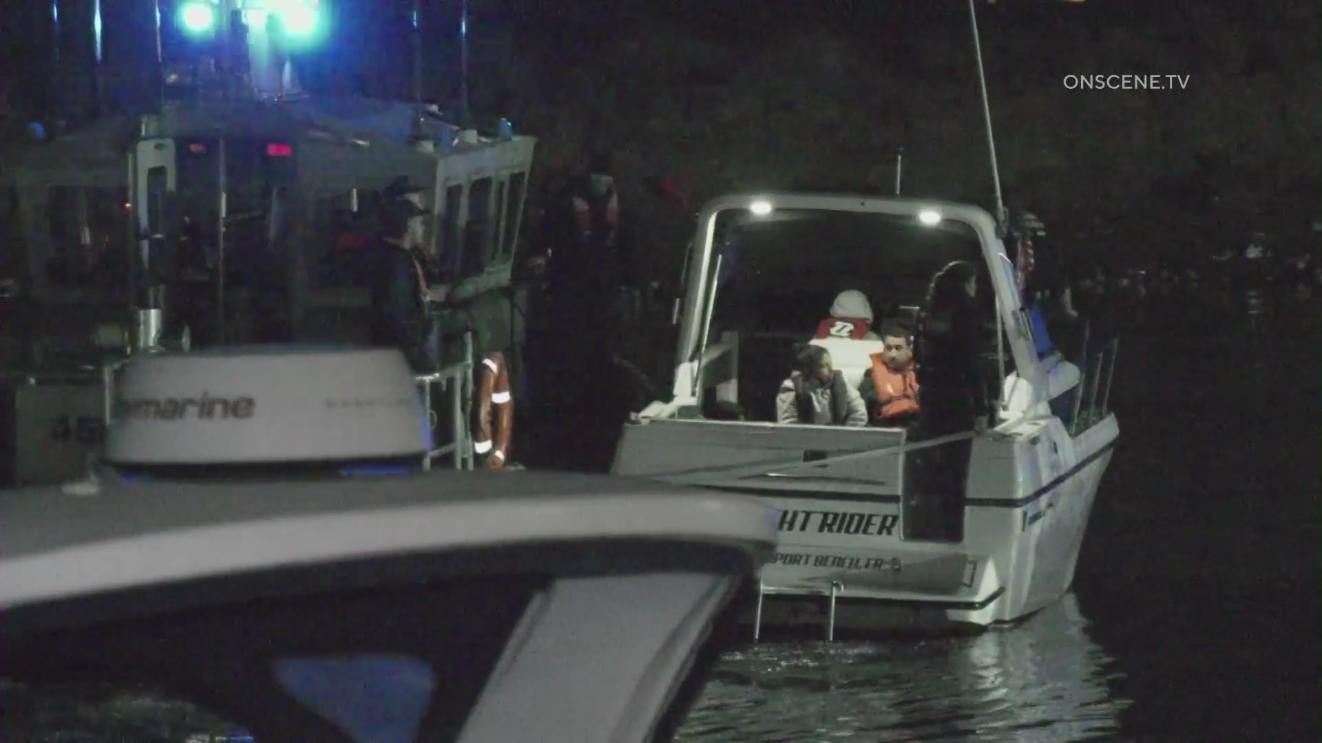 12 sickened people were rescued from a boat in Huntington Beach on Tuesday night. (OnScene.TV)