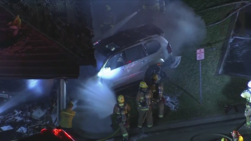 Sky5 images show the aftermath of a vehicle slamming into the garage of a Glendora home on Dec. 28, 2022.