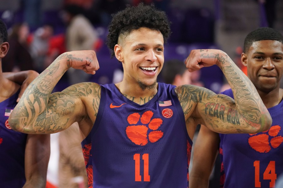 Clemson guard Brevin Galloway flexes after an NCAA college basketball game against Georgia Tech Tuesday, Jan. 24, 2023, in Clemson, S.C. Clemson won 72-51. (AP Photo/Sean Rayford)