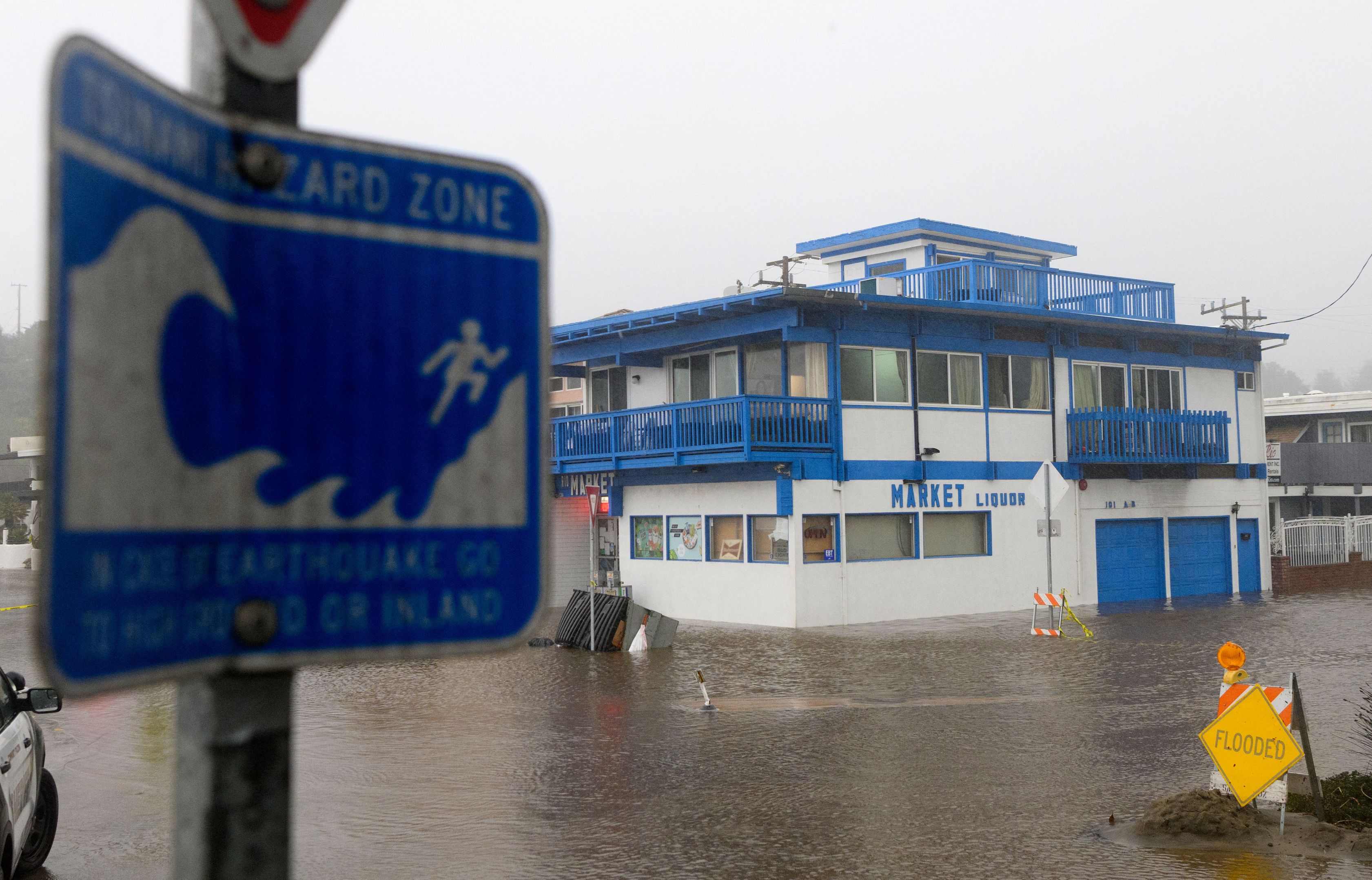 Waters rise in a flooded neighborhood in Aptos, California on Jan. 9, 2023. (JOSH EDELSON/AFP via Getty Images)