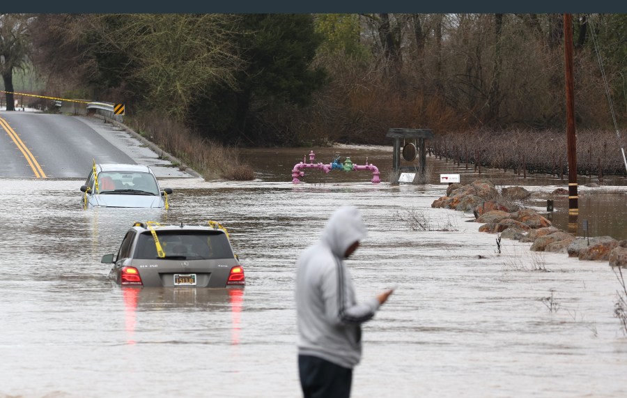 Cars are submerged in floodwater after heavy rain moved through the area on Jan. 9, 2023 in Windsor, California. (Justin Sullivan/Getty Images)