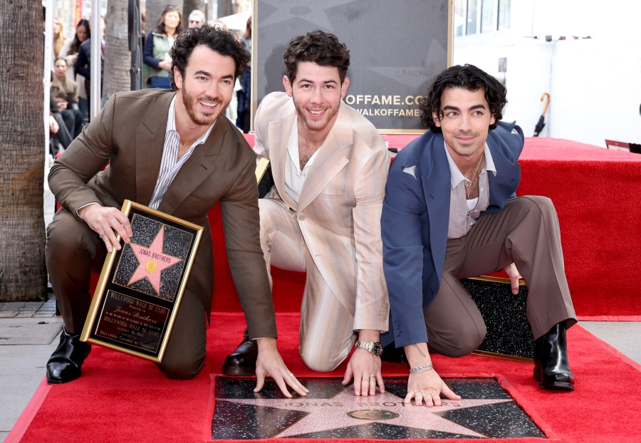 (L-R) Kevin Jonas, Nick Jonas, and Joe Jonas of The Jonas Brothers attend their Hollywood Walk of Fame star ceremony on Jan. 30, 2023. (Amy Sussman/Getty Images)