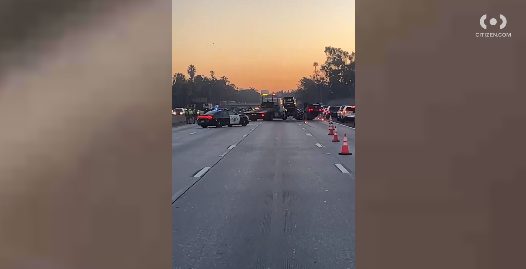 Footage shared to the Citizen app shows a car overturned after a fatal crash on the 10 Freeway in Mid-City on Jan. 21, 2023.