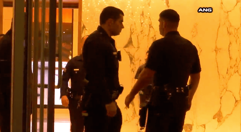 LAPD officers respond to the scene of a fatal shooting at a high-rise apartment in downtown on Jan. 30, 2023. (ANG)