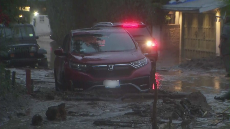 A driver tries to get through mud in Studio City on Jan. 10, 2023. (KTLA) 