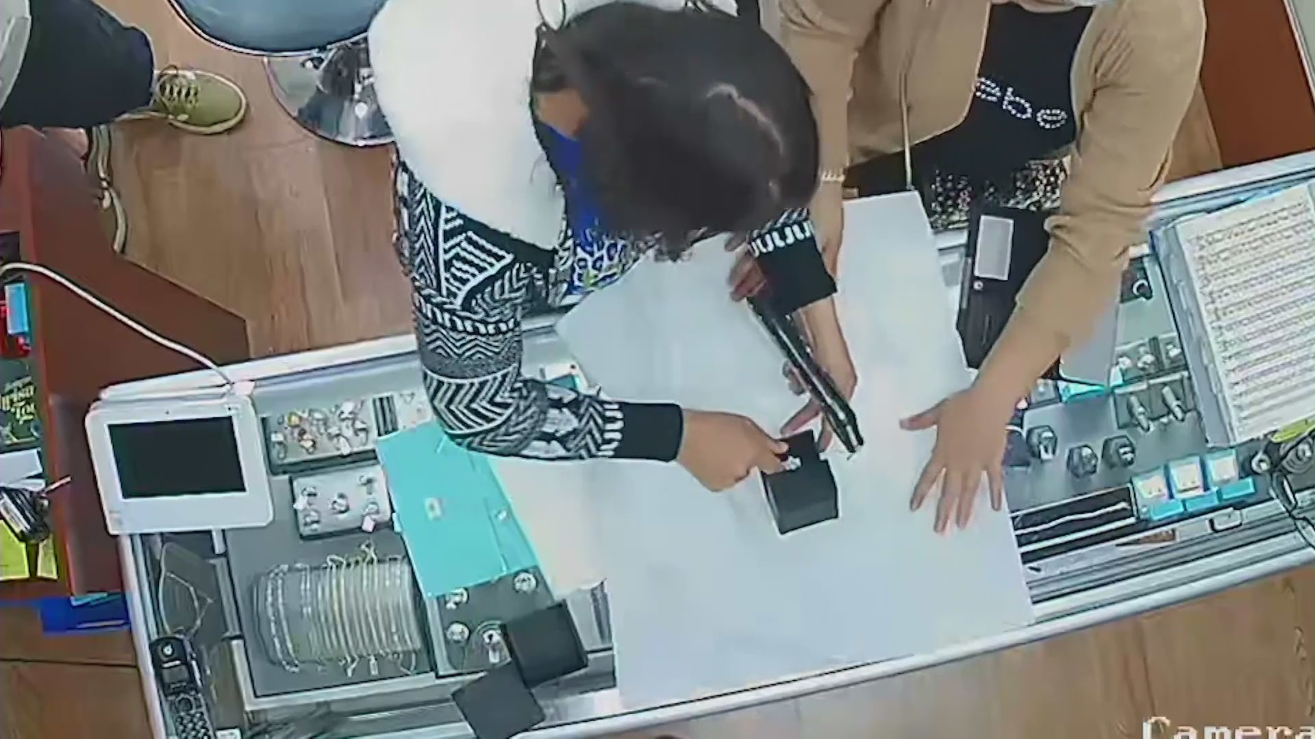 The moment a woman snatches the $40,000 ring out of the jewelry box.